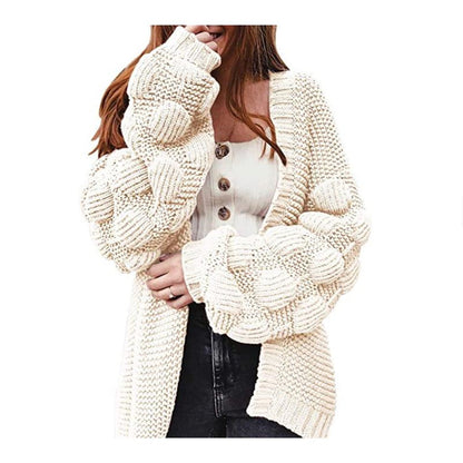 Joli pull épais et long cardigan à pompons