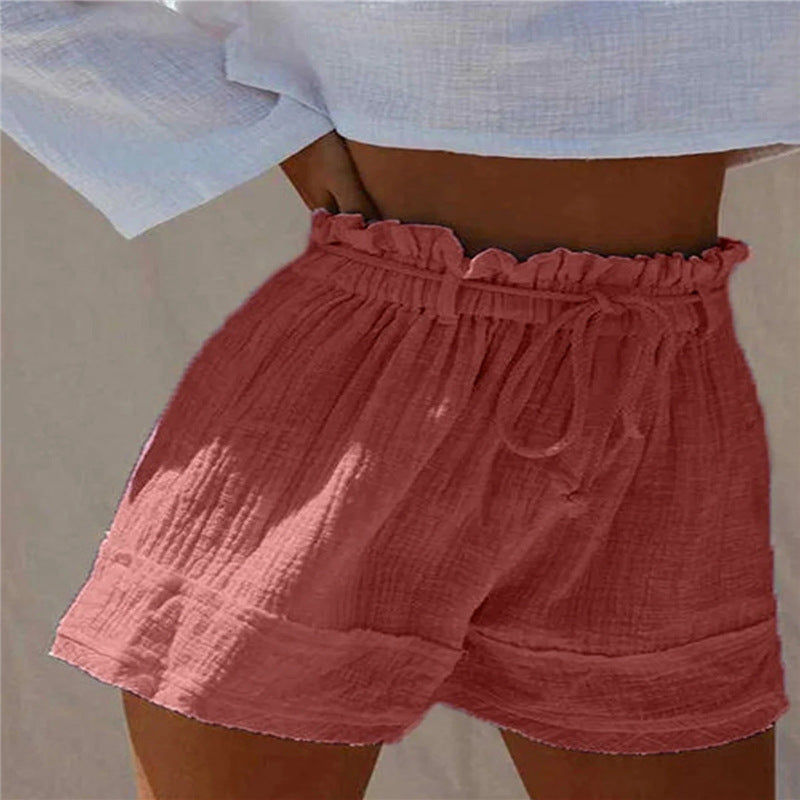 Short taille haute en coton et lin style bohème avec ceinture élastique plissée ample de couleur unie