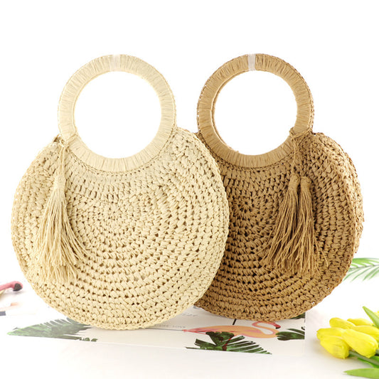 Sac rond tissé à la main en paille avec franges et pompons