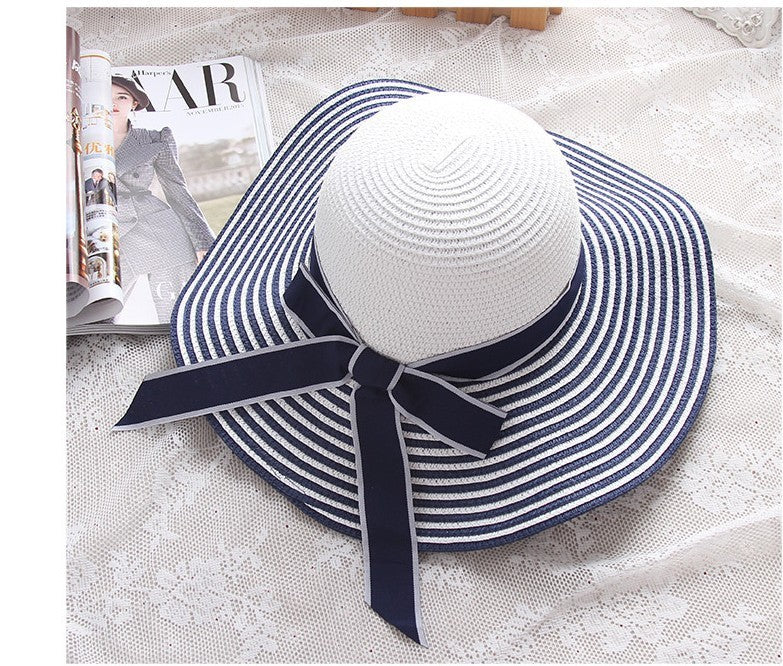 Vente chaude mode Hepburn chapeau vent noir blanc rayé nœud papillon été chapeau de soleil belle femmes paille plage chapeau large bord casquette