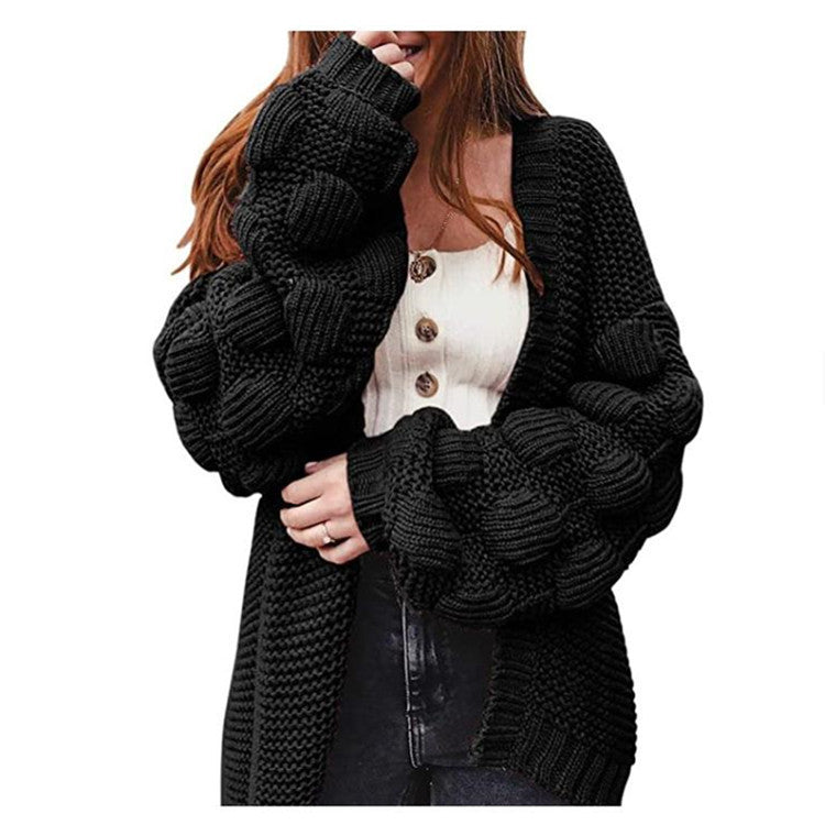 Joli pull épais et long cardigan à pompons