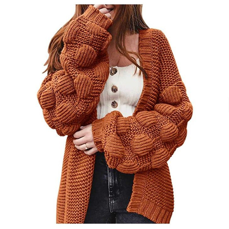 Joli pull épais et long cardigan à pompons